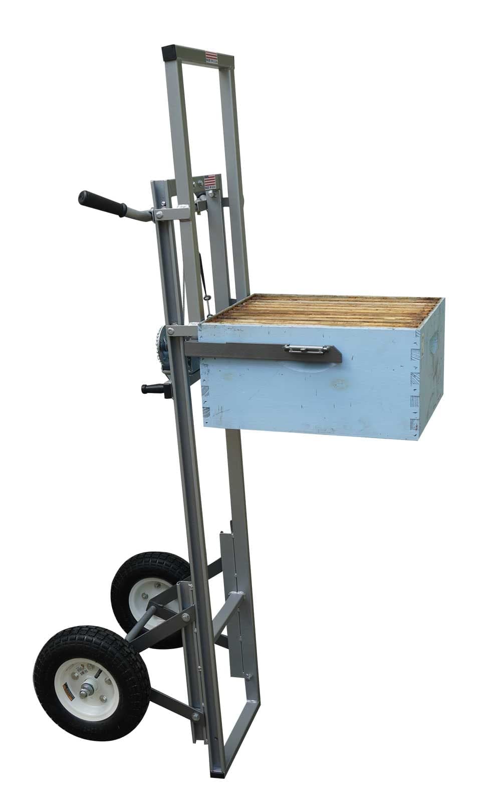 Hand-crank beehive lifting trolley moving a deep box